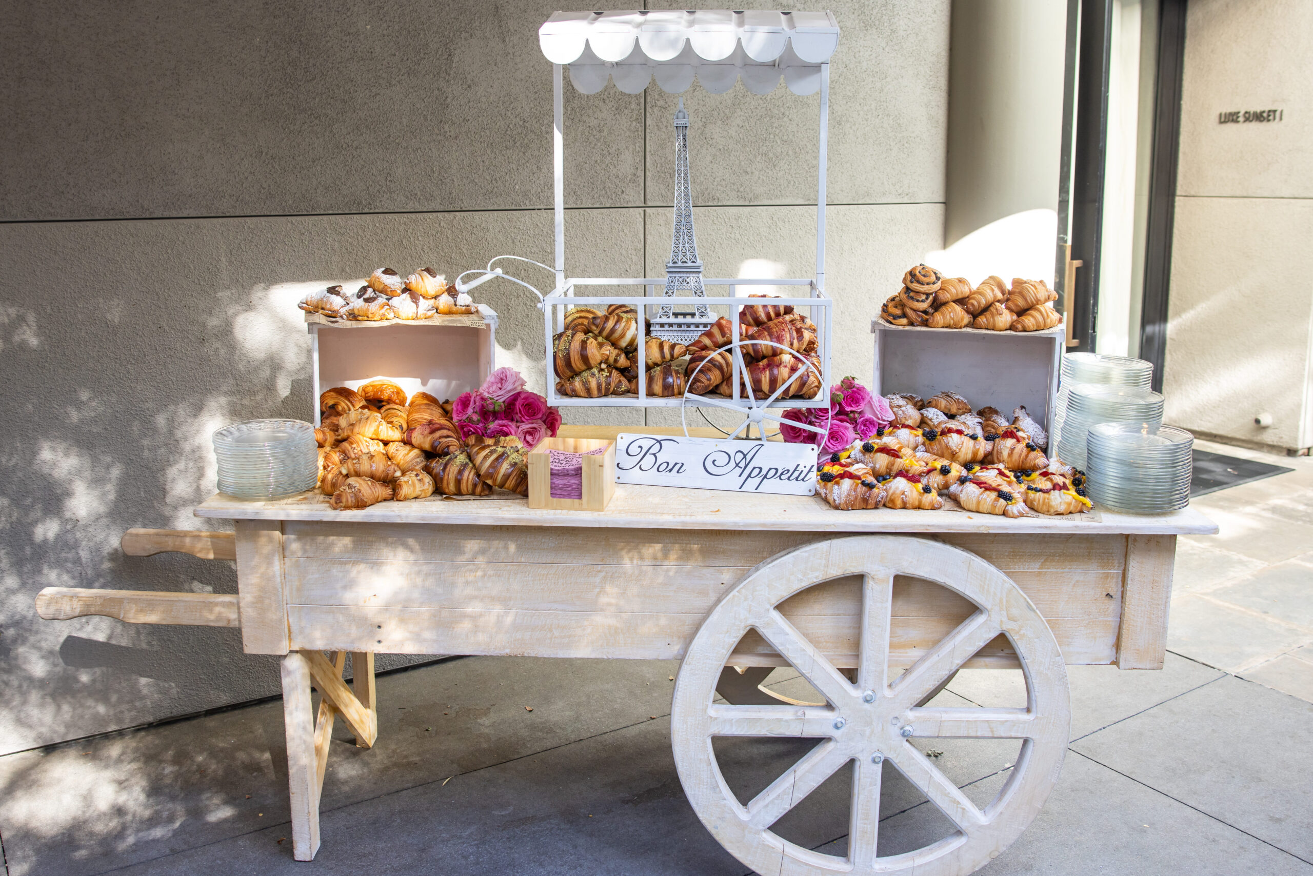 parisian dessert cart with croissants